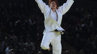 Una foto que vale una medalla y resume una vida deportiva